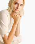 United Colors Of Benetton Woman Cream Short Sleeve Sweater In Pure Merino Wool | LEVISONS