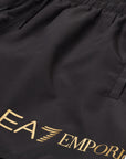 EA7 Swim Shorts With Gold Logo | LEVISONS