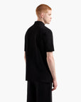 Armani Exchange Regular Fit Icon Logo Cotton Polo Shirt With Subtle Branding | LEVISONS