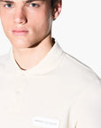 Armani Exchange White Edition Regular Fit Cotton Polo Shirt With Logo Patch | LEVISONS
