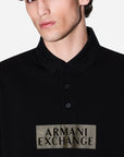 Armani Exchange Regular Fit Cotton Polo Shirt With A 3 Button Closure And Central Gold Branding | LEVISONS