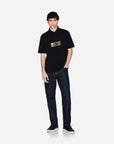 Armani Exchange Regular Fit Cotton Polo Shirt With A 3 Button Closure And Central Gold Branding | LEVISONS