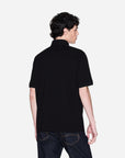 Armani Exchange Regular Fit Cotton Polo Shirt With A 3 Button Closure And Central Gold Branding | LEVISONS