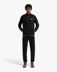 EA7 Gold Label Stretch Jacquard Trousers With Logo Patch | LEVISONS