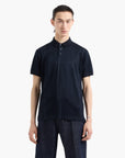 Emporio Armani Regular Fit All Over Logo Polo Shirt With Button Closure | LEVISONS