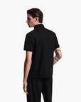 Emporio Armani All-Over Logo Cotton Jacquard Polo Shirt | LEVISONS