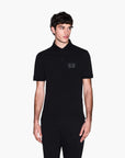 Armani Exchange Black And Gold Regular Fit Cotton Polo Shirt With Logo Patch | LEVISONS