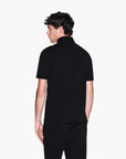 Armani Exchange Black And Gold Regular Fit Cotton Polo Shirt With Logo Patch | LEVISONS