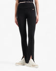 EA7 Slim Fit Cotton Stretch Leggings With Front Slits And Gold Logo Plaque | LEVISONS