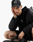 Armani Exchange Icon Zip-Up Down Jacket With A Hoodie And Monochromatic Logo Patch | LEVISONS