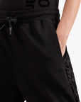 EA7 Graphic Series Cotton Joggers With All-Over Logo Detail | LEVISONS
