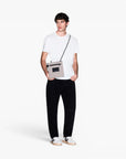 Armani Exchange Black And Gold Regular Fit Cotton T-Shirt With Logo Tape | LEVISONS