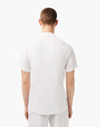 Lacoste Sport Breathable Run-Resistant Interlock Polo Shirt | LEVISONS