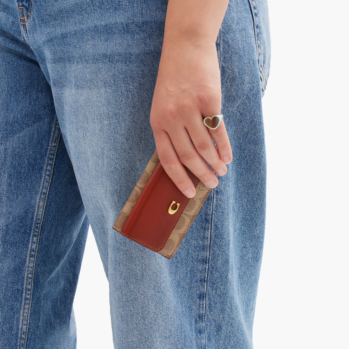 Discover the Coach Essential Mini Trifold Wallet: A Stylish and Functional Accessory