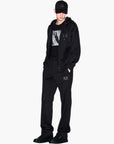 Armani Exchange Black And Gold Relaxed Fit Jogger Pants With Logo Patch | LEVISONS
