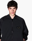 Armani Exchange Black And Gold Dual Zip Bomber Jacket With A Logo Patch | LEVISONS