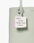 Kate Spade Charmed Love Notes Bag Charm | LEVISONS