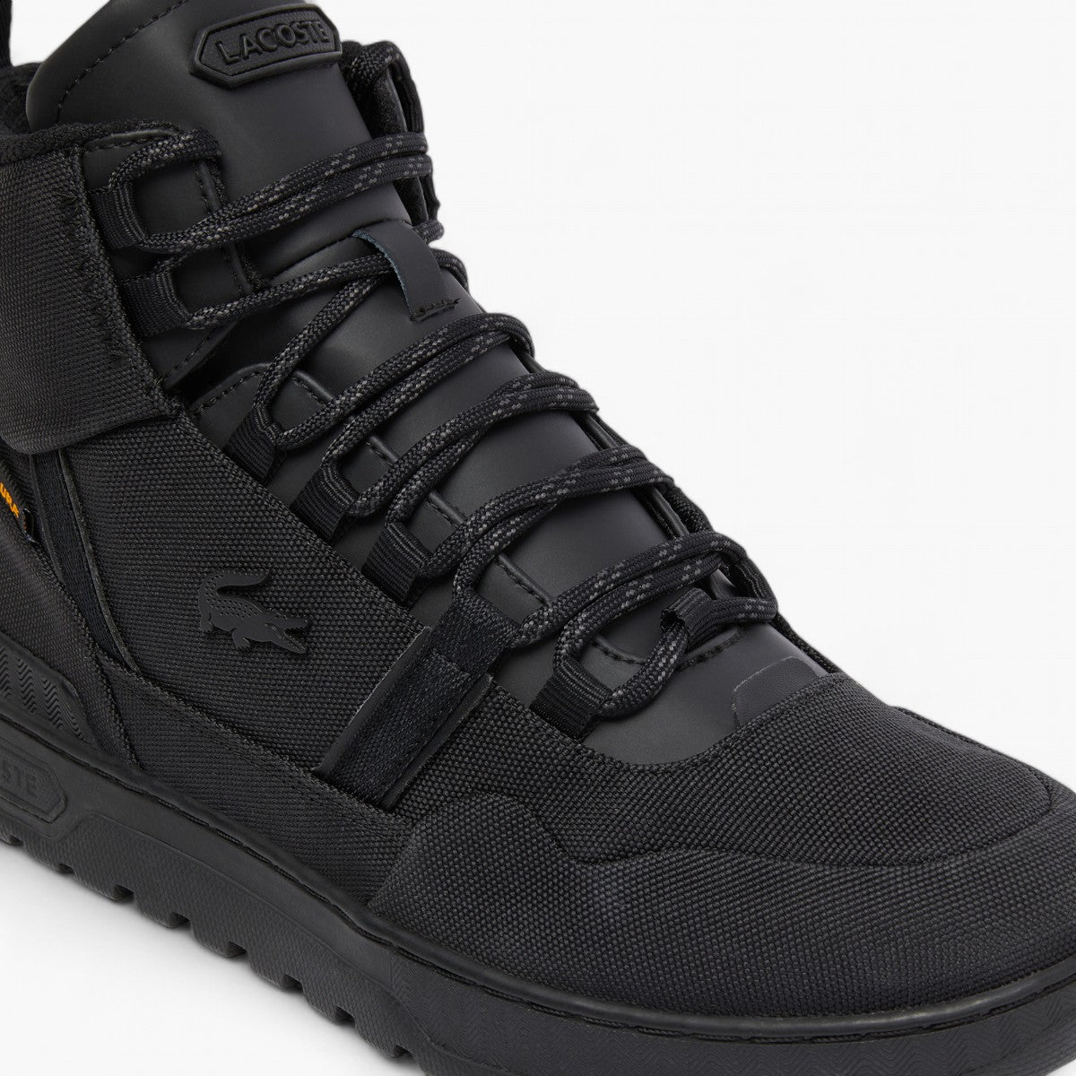 Lacoste T-Clip Mid-Top Trainers | LEVISONS