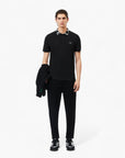 Lacoste Slim Fit Movement Lightweight Piqué Polo Shirt | LEVISONS