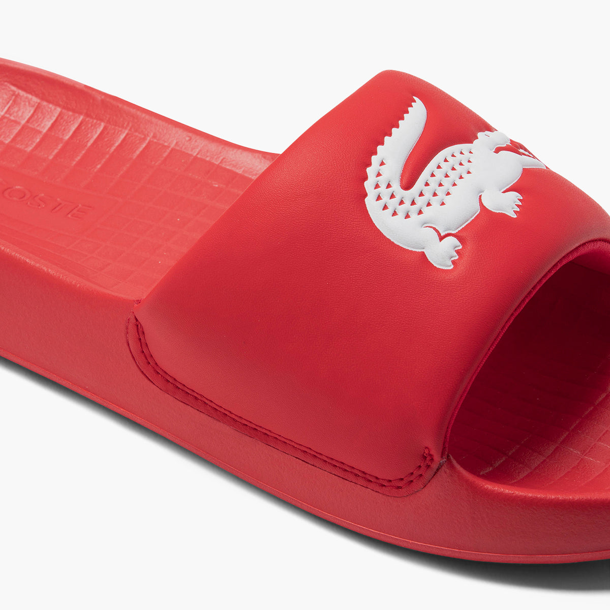 Lacoste store red slides